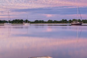 Boats on Taylor Creek at dawn in Beaufort.