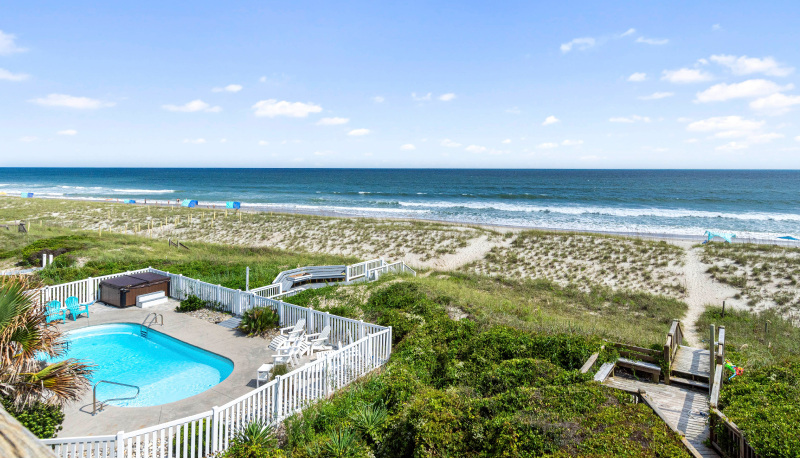 image of Always Sunny pool and beach boardwalk