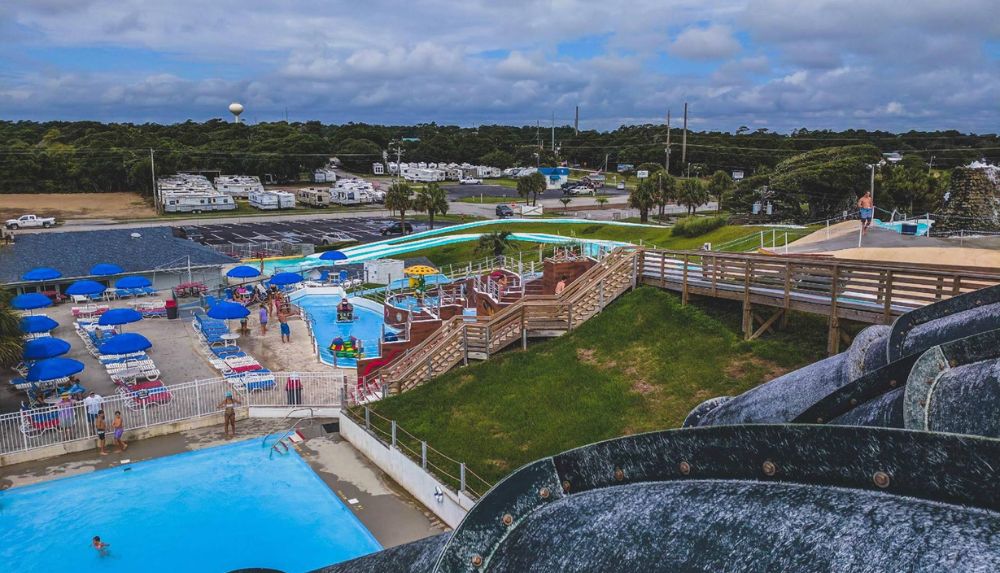 Ride water slides at Salty Pirate Water Park