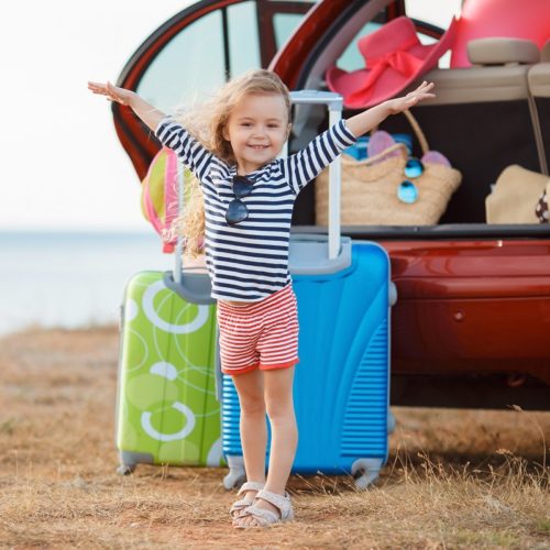 Girl Traveling in Packed Car