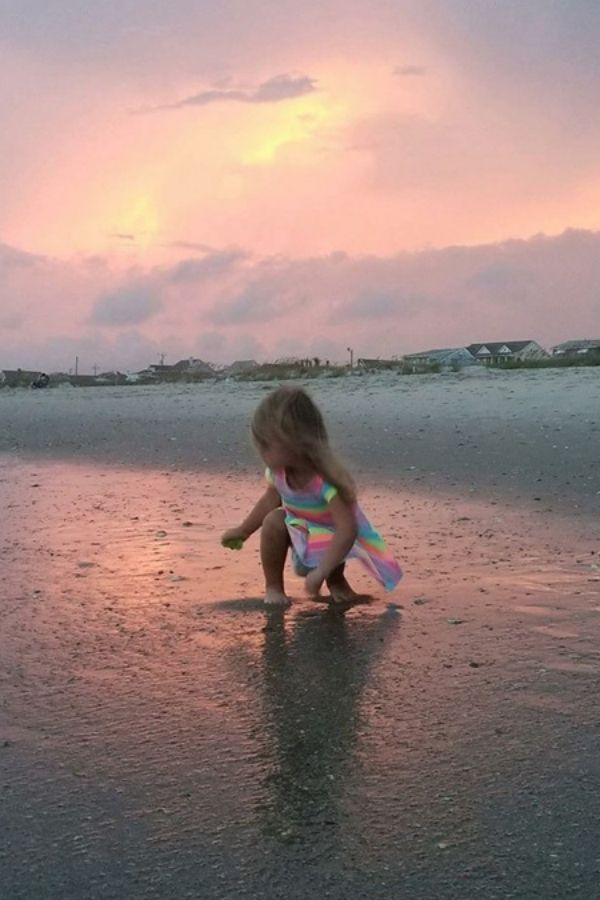 Girl finding seashells on Southern Outer Banks beaches