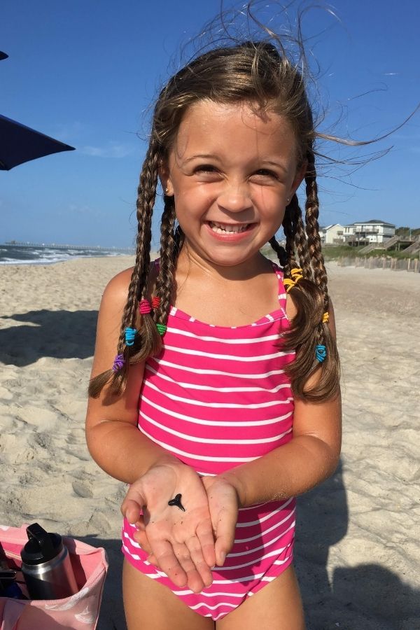 Girl finds shark tooth on Southern Outer Banks beaches