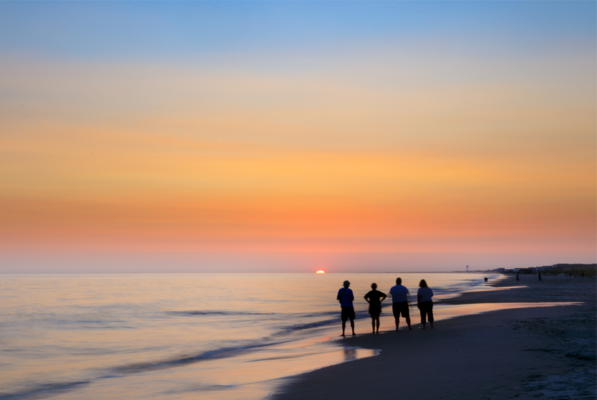 Watch a sunset at the beach in Emerald Isle