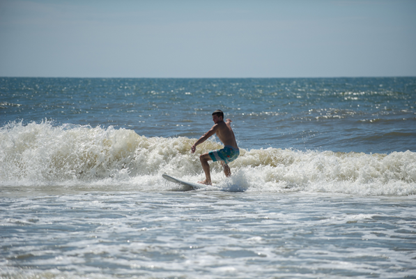 Go surfing on Emerald Isle beaches