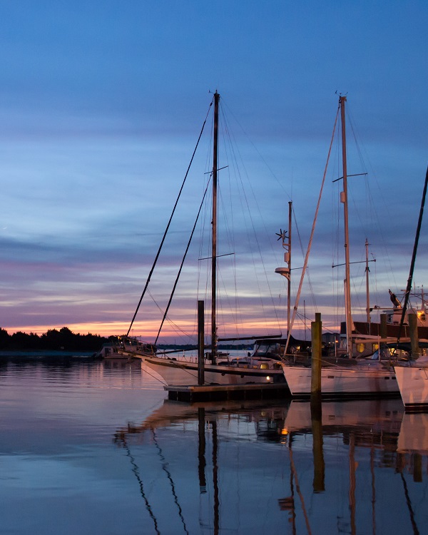 Amazing sunset with sailboats in Beaufort, NC harbor