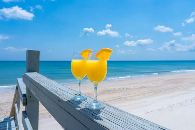 Enjoy mimosas on the beach during your fall girls getaway