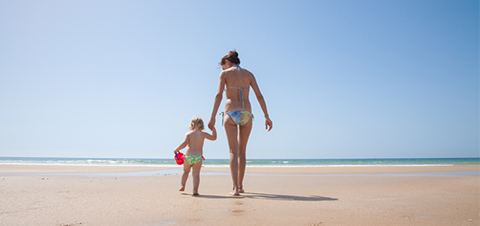 mom and toddler on beach