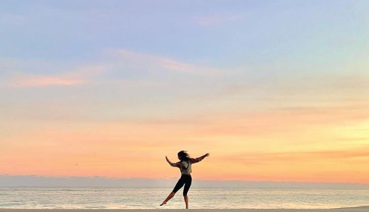 Enjoy dancing on the beach when you book your 2023 vacation with Emerald Isle Realty.
