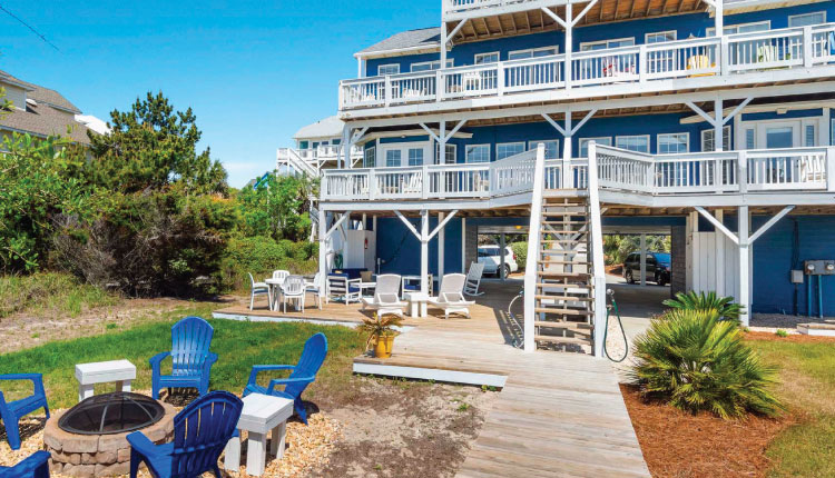 Enjoy fireside chats at your private rental when you book your 2023 vacation with Emerald Isle Realty.