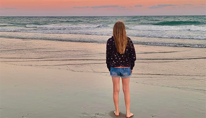 Emerald Isle girl enjoying the sunset.