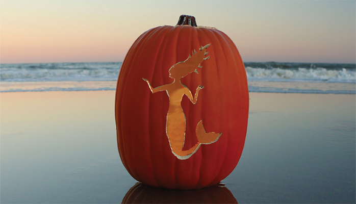 Mermaid carved pumpkin on the beach in Pigeon Forge.