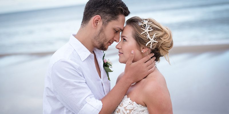 Wedding Pictures on Beach couple posing together